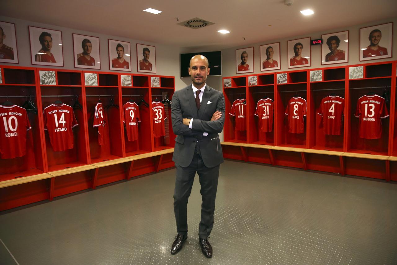 Guardiola "prend possession" de ses nouveaux murs. [REUTERS - Alexander Hassenstein]