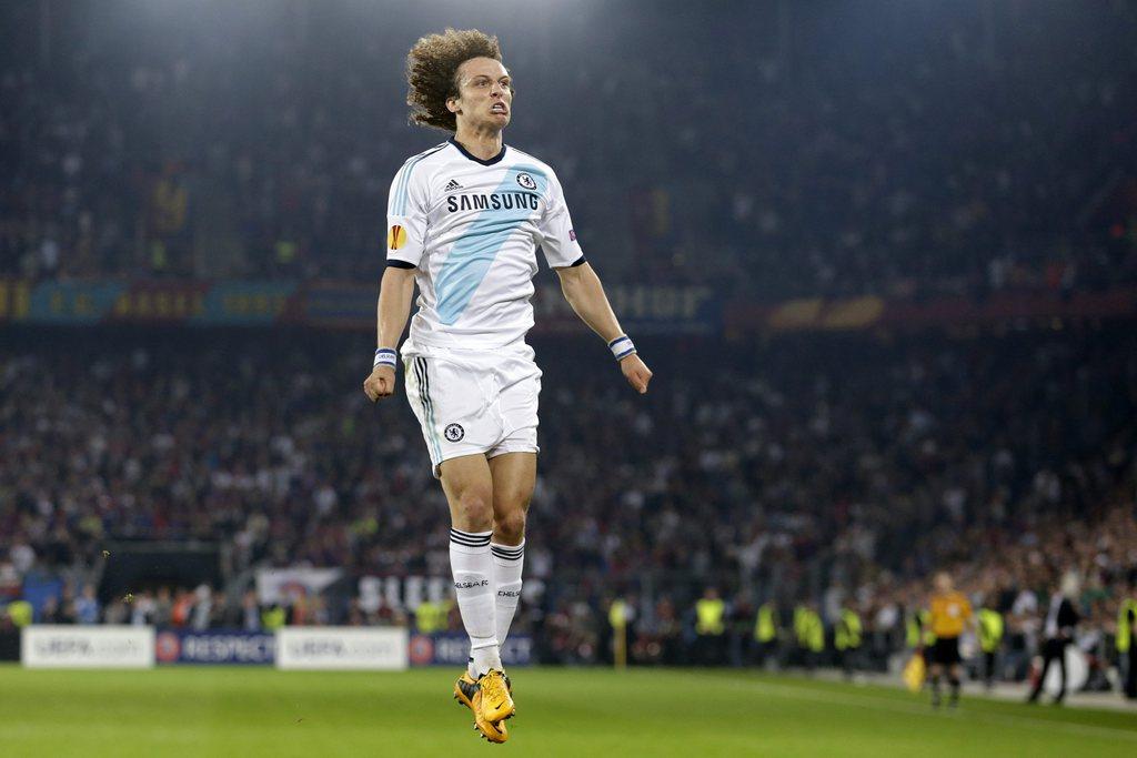 Bourreau du FC Bâle, David Luiz exulte après sa réussite sur coup-franc. [KEYSTONE - SALVATORE DI NOLFI]