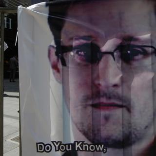 La justice américaine a demandé à Hong Kong d'interpeller Edward Snowden. [AP Photo/Kin Cheung]