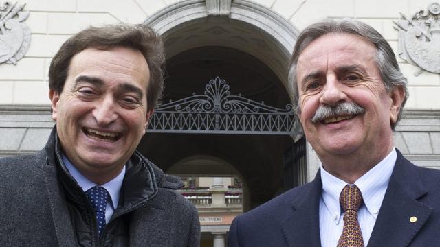 Le duel acharné entre le maire sortant Giorgio Giudici (droite) et le ministre Marco Borradori (gauche) tient tout le Tessin en haleine. [Karl Mathis]