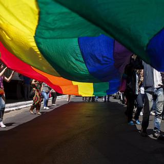 Un nouvel indice servira à mesurer les performances boursières de sociétés qui respectent les droits des membres des communautés gays et lesbiennes. [EPA/Keystone - Santi Carneri]