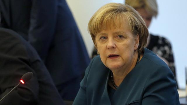 Angela Merkel doit faire des concessions pour trouver un accord de gouvernement avec le SPD. [AP Photo/Michael Sohn]