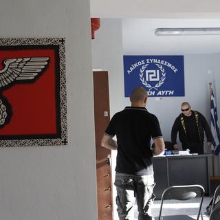 La fusillade avait eu lieu à proximité d'un local du parti néonazi grec Aube dorée. [AP Photo/Petros Giannakouris]