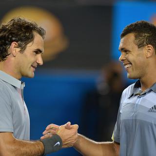 Federer retrouve Tsonga, comme ici à Melbourne en janvier 2013. [Paul Crock]