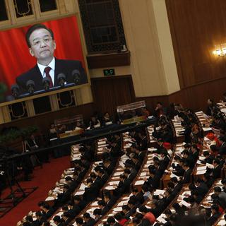 Devant les quelque 3000 délégués de l'Assemblée nationale populaire, Wen Jiabao a présenté le traditionnel rapport d'activité du gouvernement chinois. [HOW HWEE YOUNG]