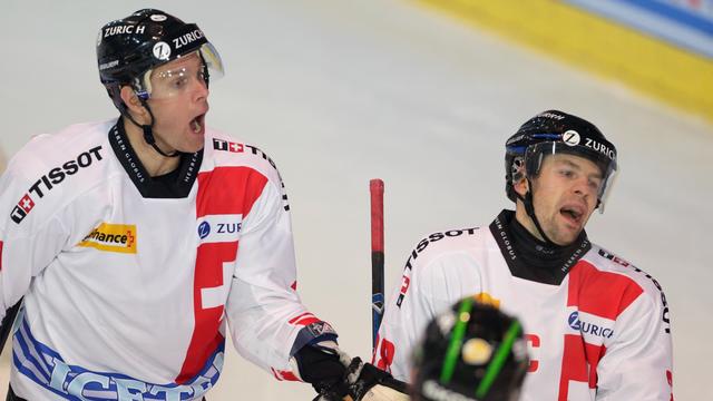 La Suisse, ici Ryan Gardner et Martin Plüss, a dû s'avouer vaincue dans "son" tournoi. [Arno Balzarini]