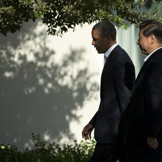 Le président américain Barack Obama, et le président chinois Xi Jinping. [AP Evan Vucci]