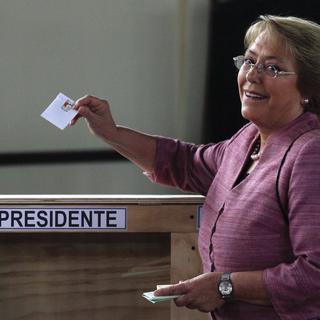 Michèle Bachelet va-t-elle remporter les élections dès le 1er tour? [AP Photo - Luis Hidalgo]