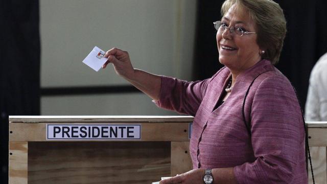 Michèle Bachelet va-t-elle remporter les élections dès le 1er tour? [AP Photo - Luis Hidalgo]