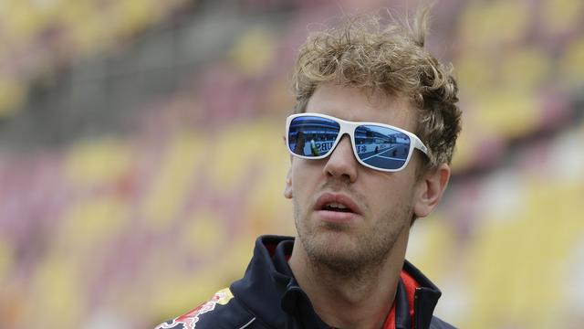 Vettel persiste et signe dans le "conflit" qui l'oppose à Webber. [Mark Baker]