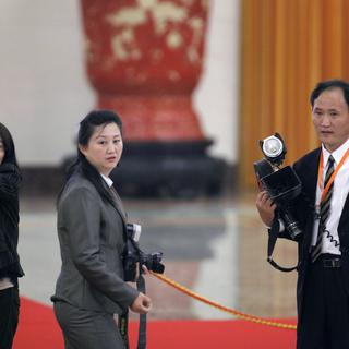 Des journalistes chinois lors d'une cérémonie officielle. [Barry Huang]