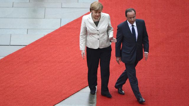 Angela Merkel et François Hollande célébrent 50 ans d'amitié franco-allemande. [Odd Andersen]