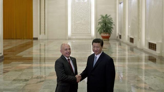Ueli Maurer et le président chinois Xi Jinping. [AP/Alexander F.Yuan]