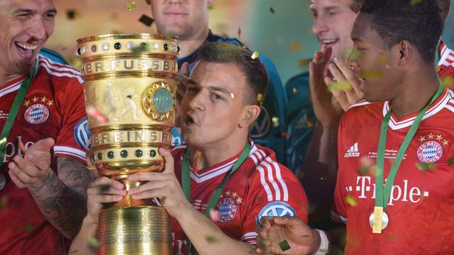 Xherdan Shaqiri (avec la Coupe d'Allemagne) aura tout gagné cette saison avec le Bayern. [Maurizio Gambarini]