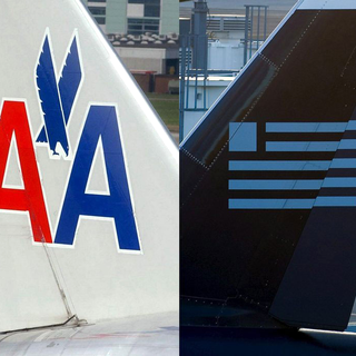 Les deux compagnies américaines vont se réunir sous le nom d'American Airlines. [EPA/Keystone - Steffen Schmidt]