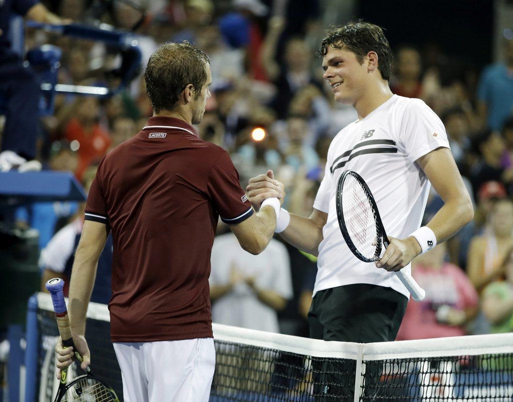 Raonic (à droite) a manqué une balle de match. [KEYSTONE - Darron Cummings]