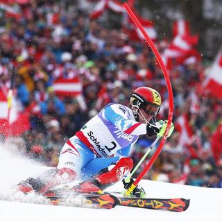 Marcel Hirscher of Austria skis during the first run of the men's Slalom race at the World Alpine Skiing Championships in Schladming February 17, 2013. REUTERS/Dominic Ebenbichler (AUSTRIA - Tags: SPORT SKIING TPX IMAGES OF THE DAY) [Dominic Ebenbichler]