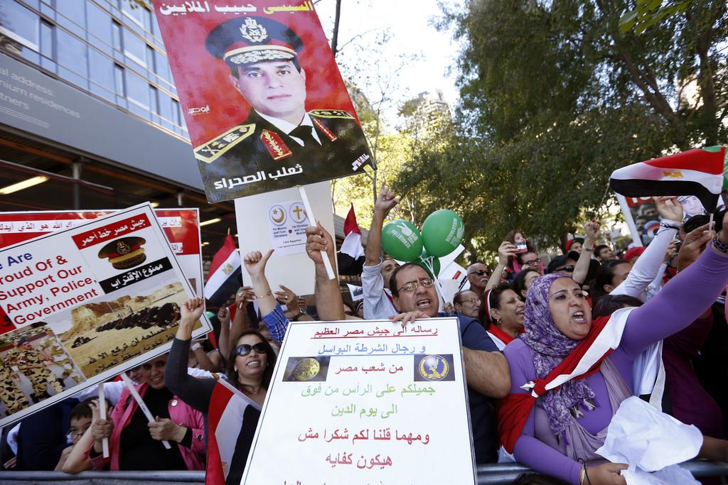 Des partisans du gouvernement égyptien devant le siège de l'ONU. [AP/Keystone - Jason DeCrow]