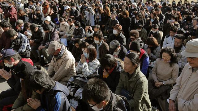 A l'heure du séisme qui a frappé le Japon, 14h46 locales (05h46 GMT), une minute de silence a été observée à travers tout le pays. [Itsuo Inouye]