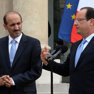 Le chef l'opposition syrienne Ahmad Jarba aux côtés de François Hollande. [Pierre Andrieu]
