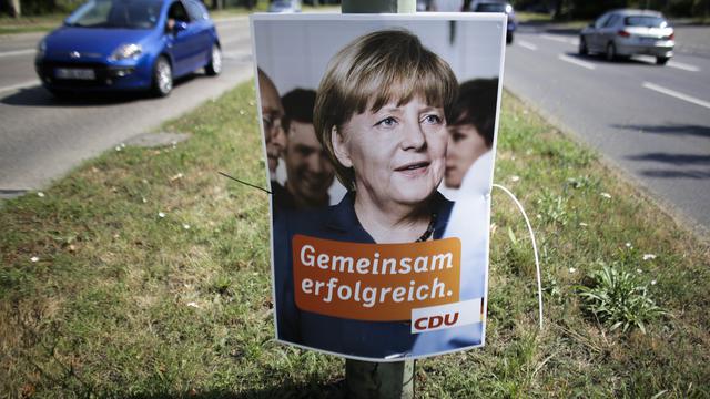Angela Merkel en campagne. [AP Photo/Markus Schreiber]