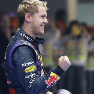 Sebastian Vettel a décroché ce dimanche matin son 4e titre de champion du monde de Formule 1. [Mark Baker - AP Photo]