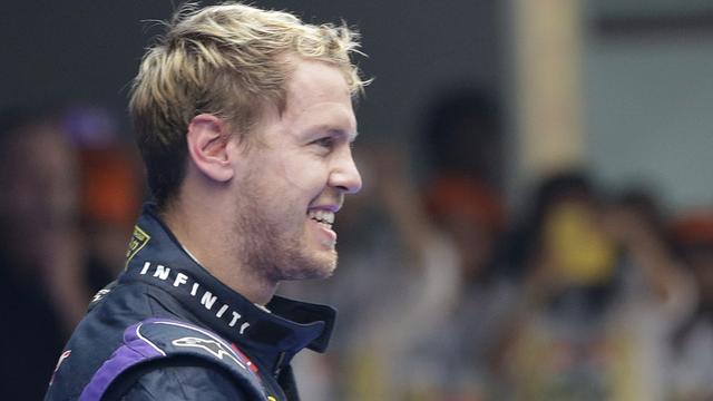 Sebastian Vettel a décroché ce dimanche matin son 4e titre de champion du monde de Formule 1. [Mark Baker - AP Photo]