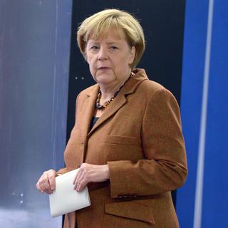 Angela Merkel devrait l'emporter, mais dans quel contexte? [EPA/Keystone - Federico Gambarini]