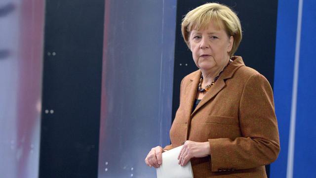 Angela Merkel devrait l'emporter, mais dans quel contexte? [EPA/Keystone - Federico Gambarini]