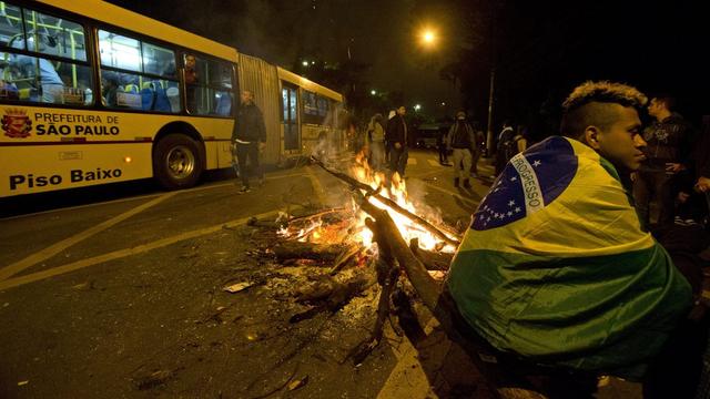 La hausse du prix du billet de bus à Sao Paulo est la goutte d'eau qui a fait déborder le vase de la contestation au Brésil. [EPA/Keystone - Sebastião Moreira]