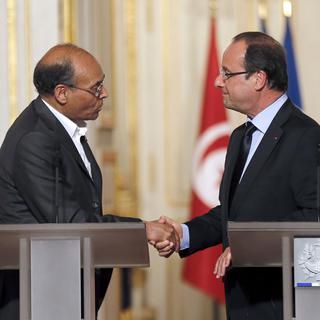 Moncef Marzouki accueille à son tour François Hollande (qui l'avait reçu à Paris en juillet 2012). [François Guillot]