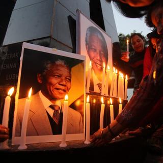 Une centaine de chefs d'Etat et de gouvernement étaient dans les tribunes du stade de Soweto à l'occasion de la cérémonie en hommage à Nelson Mandela. [EPA/Keystone - Raminder Pal Singh]