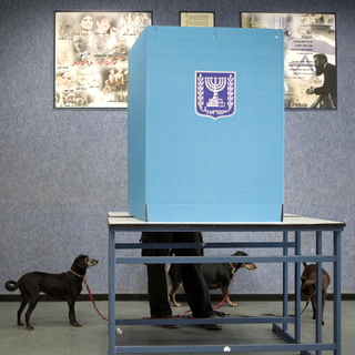 Quelque 5,6 millions d'Israéliens votent pour renouveler leurs 120 députés. [AP/Keystone - Dan Balilty]