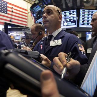 Les tensions politiques autour du shutdown affectent les marchés à Wall Street. [AP Photo/Richard Drew]