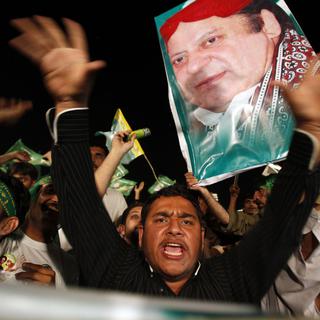 Des supporters de l'ex-Premier ministre pakistanais Nawaz Sharif, à Rawalpindi. [AP Photo - Anjum Naveed]
