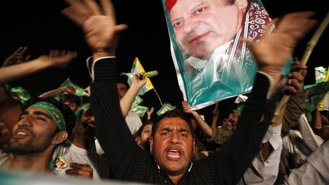 Des supporters de l'ex-Premier ministre pakistanais Nawaz Sharif, à Rawalpindi. [AP Photo - Anjum Naveed]