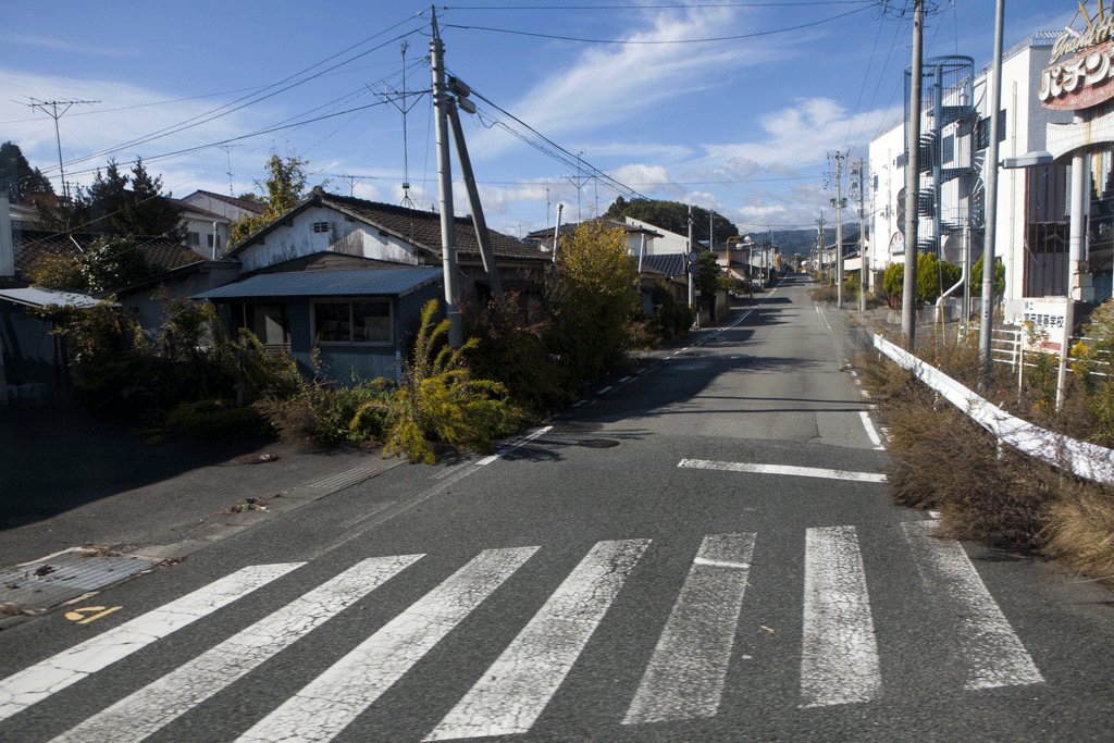 Deux ans après la catastrophe de Fukushima, des habitants vivent toujours dans la zone contaminée. [AFP - David Guttenfelder]