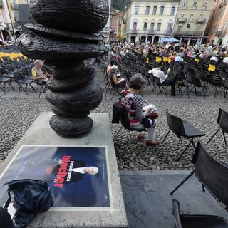 L'affiche du film placardée sur la Piazza Grande. [Urs Flueeler]