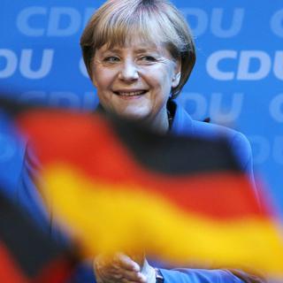Angela Merkel savoure sa large victoire. [AP/Keystone - Michael Sohn]
