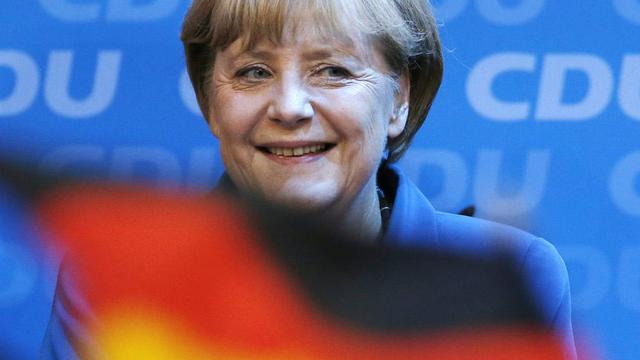 Angela Merkel savoure sa large victoire. [AP/Keystone - Michael Sohn]