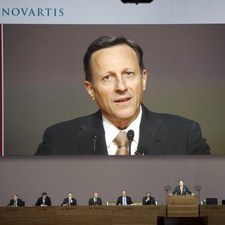 FILE --- Daniel Vasella, Chairman of Swiss pharmaceutical group Novartis, speaks during the general assembly in Basel, Switzerland, Thursday, February 23, 2012. Having served in leadership positions as CEO and Chairman of Novartis for 17 years, Dr. Daniel Vasella has decided not to stand for re-election to the Novartis Board of Directors at the company's Annual General Meeting (AGM) on February 22, 2013. Dr. Joerg Reinhardt is proposed as the new Director of Novartis AG and designated non-executive Chairman of the Board of Directors, effective as of August 1, 2013. During the transition period, current Vice-Chairman Prof. Dr. Ulrich Lehner will lead the Board on an ad interim basis. (KEYSTONE/Georgios Kefalas) [Georgios Kefalas]