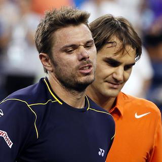 Wawrinka-Federer: l'un monte, l'autre chute... [Danny Moloshok]