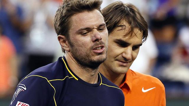 Wawrinka-Federer: l'un monte, l'autre chute... [Danny Moloshok]