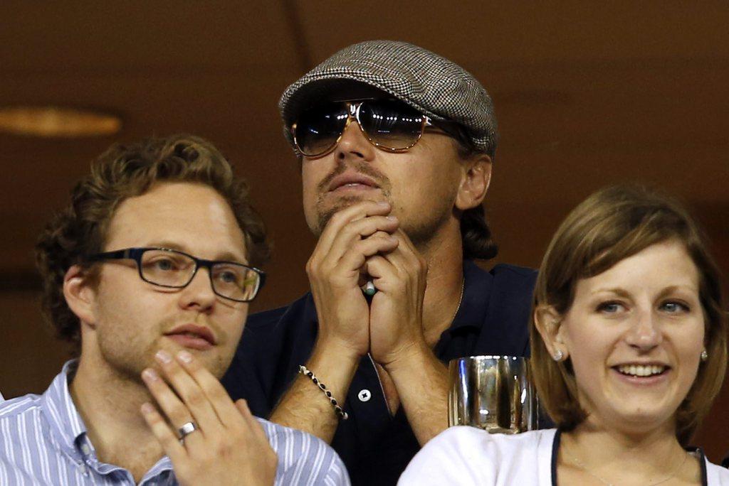 Leonardo Di Caprio a semblé apprécier le spectacle présenté par Serena Williams. [Jason Decrow]