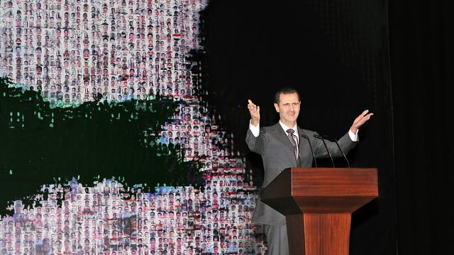 Bachar al-Assad lors de son discours à Damas. [Sana/AFP]