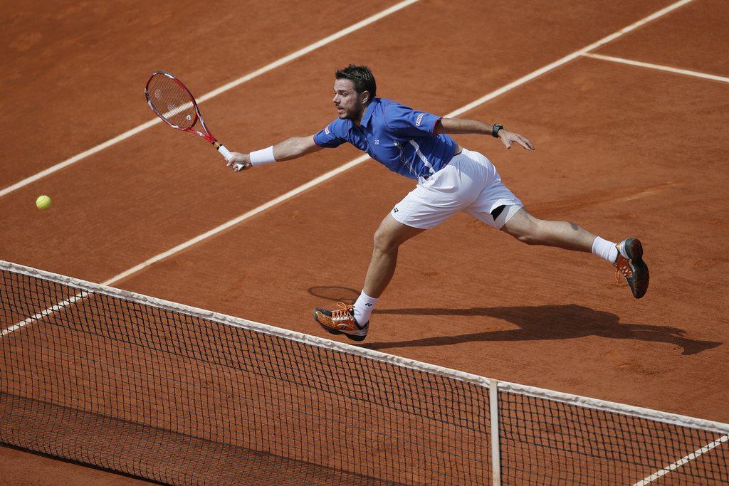 Touché à la cuisse droite, Wawrinka a tenu bon. [Petr David Josek]