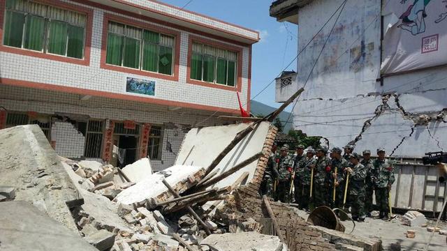 De nombreux bâtiments ont été détruits par le tremblement de terre du Sichuan. [KEYSTONE - Xinhua / Hai Mingwei]