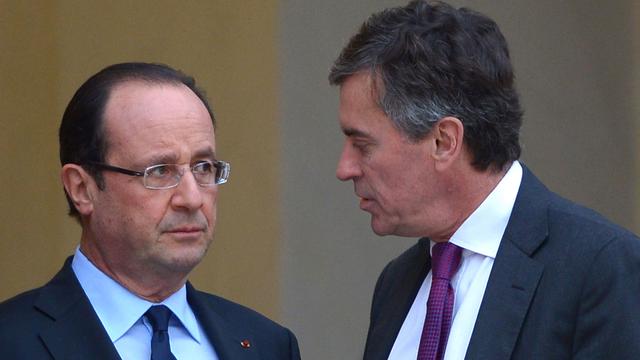Le président français François Hollande et son ex-ministre des Finances Jérôme Cahuzac. [Miguel Medina]