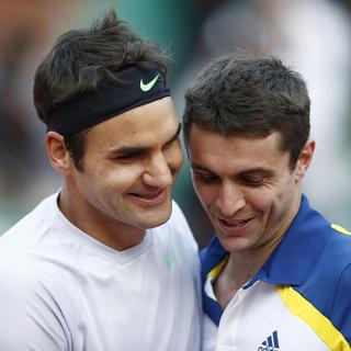 Simon a donné du fil à retordre à Federer. [Martin Bureau]