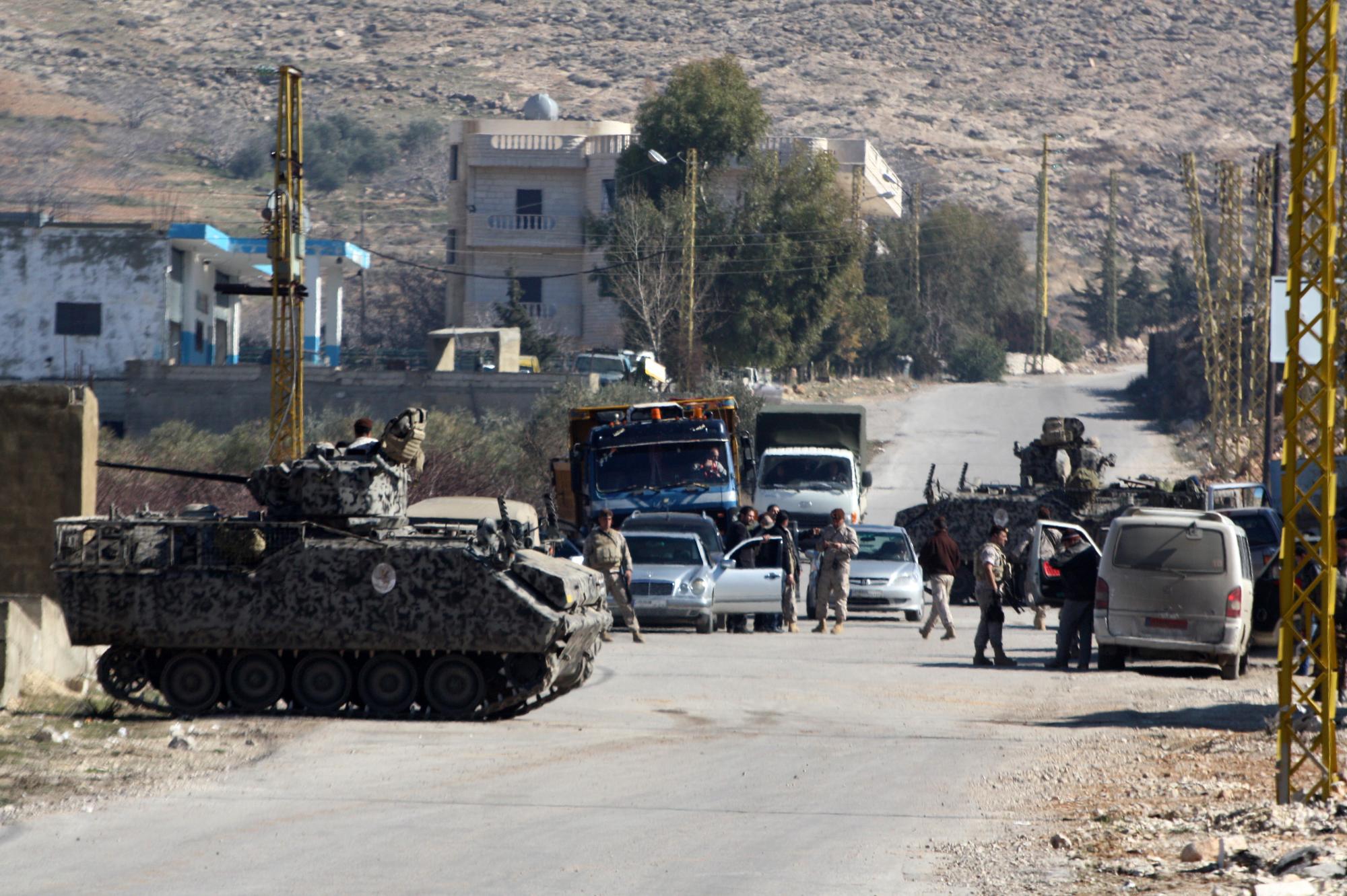 Un contrôle militaire à la frontière entre le Liban et la Syrie. [AFP - Stringer]